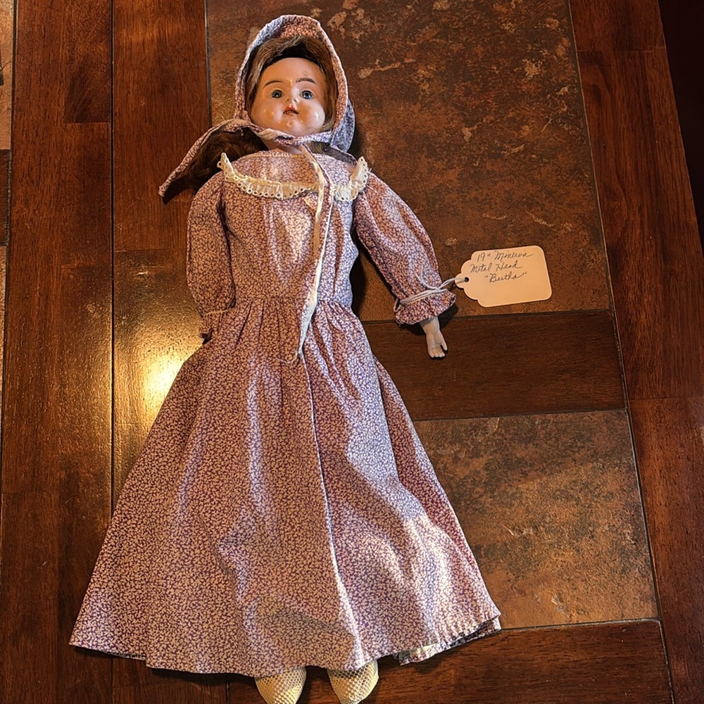 Antique 1890s 19 inch Minerva metal head, “Bertha” doll